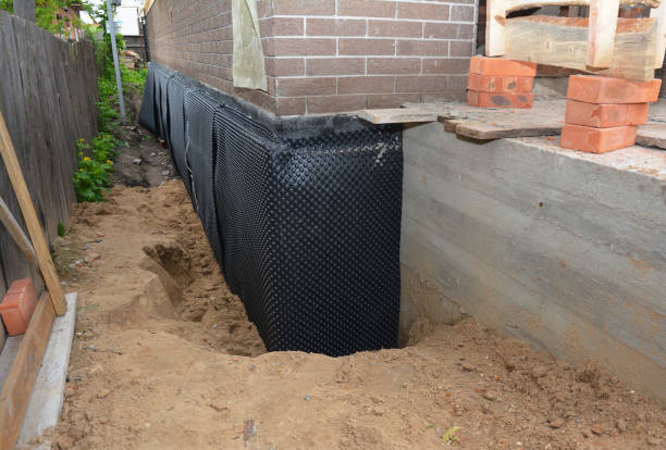 Happy homeowners after waterproofing job in Brecksville